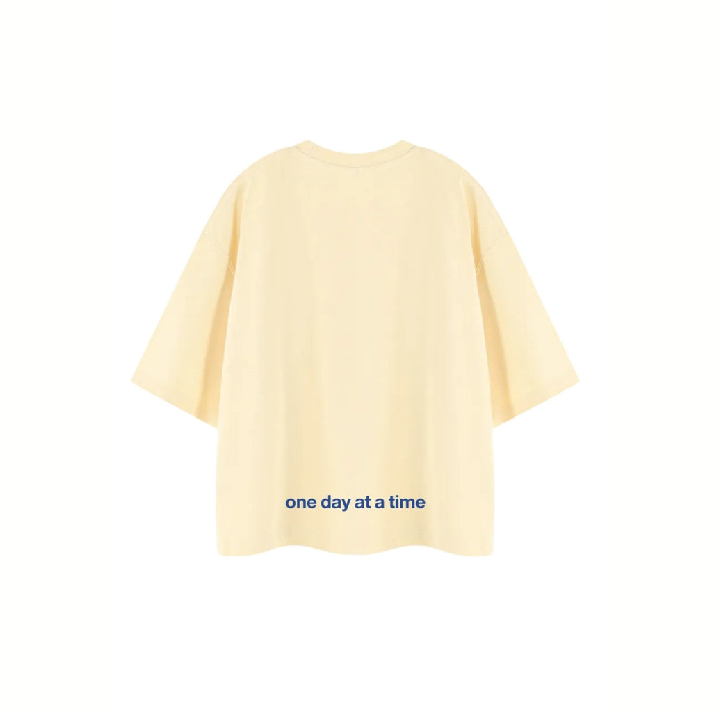 BOXY FIT ONE DAY AT A TIME BUTTER YELLOW